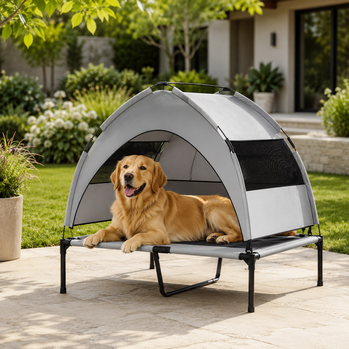 Dog lying on a portable pet bed in a garden setting