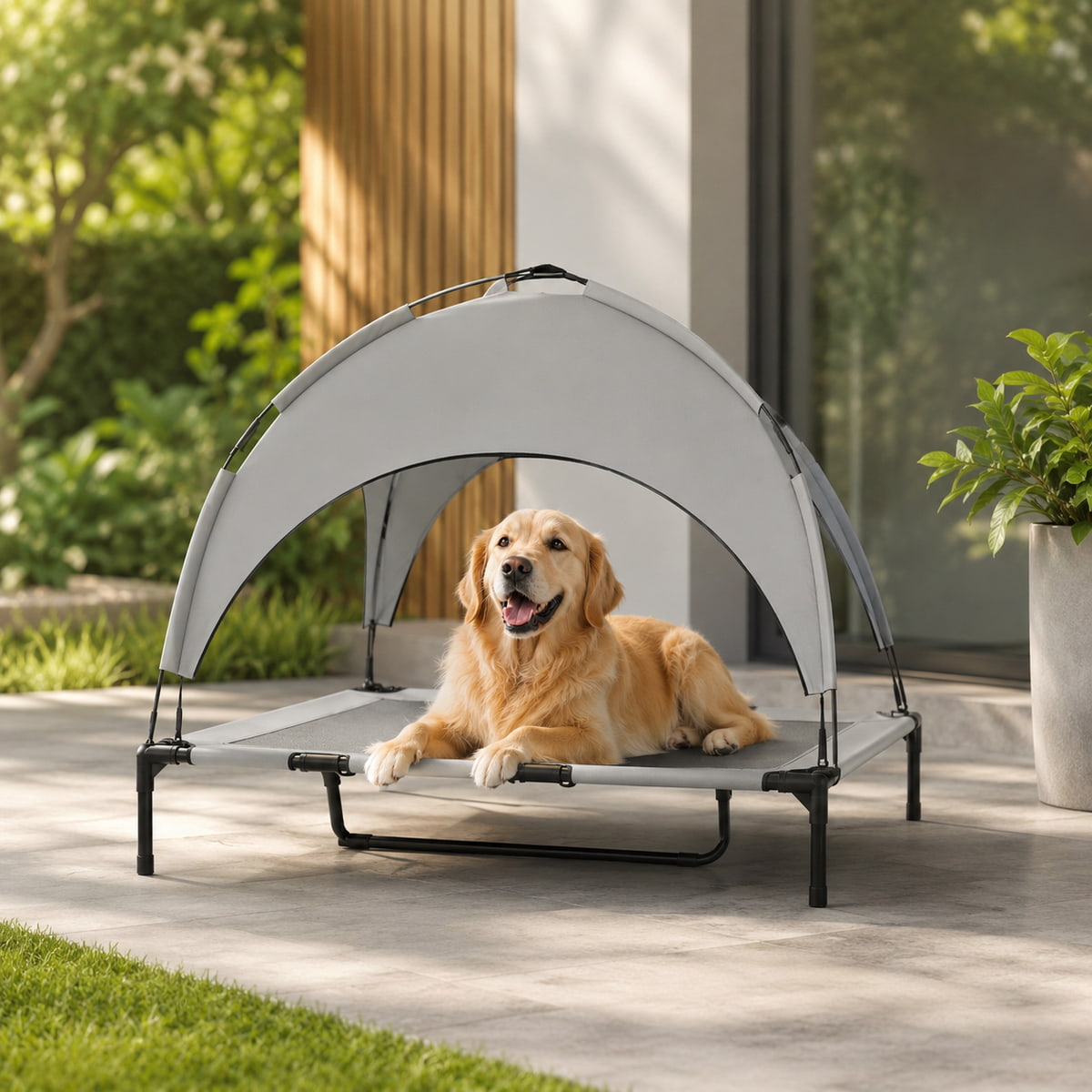 Dog lying on a pet bed with canopy outdoors
